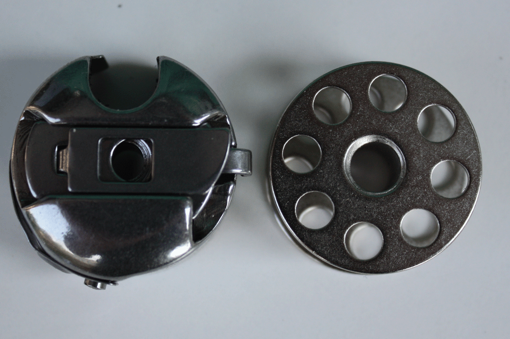 Side load bobbin, no need to remove work to change bobbin.