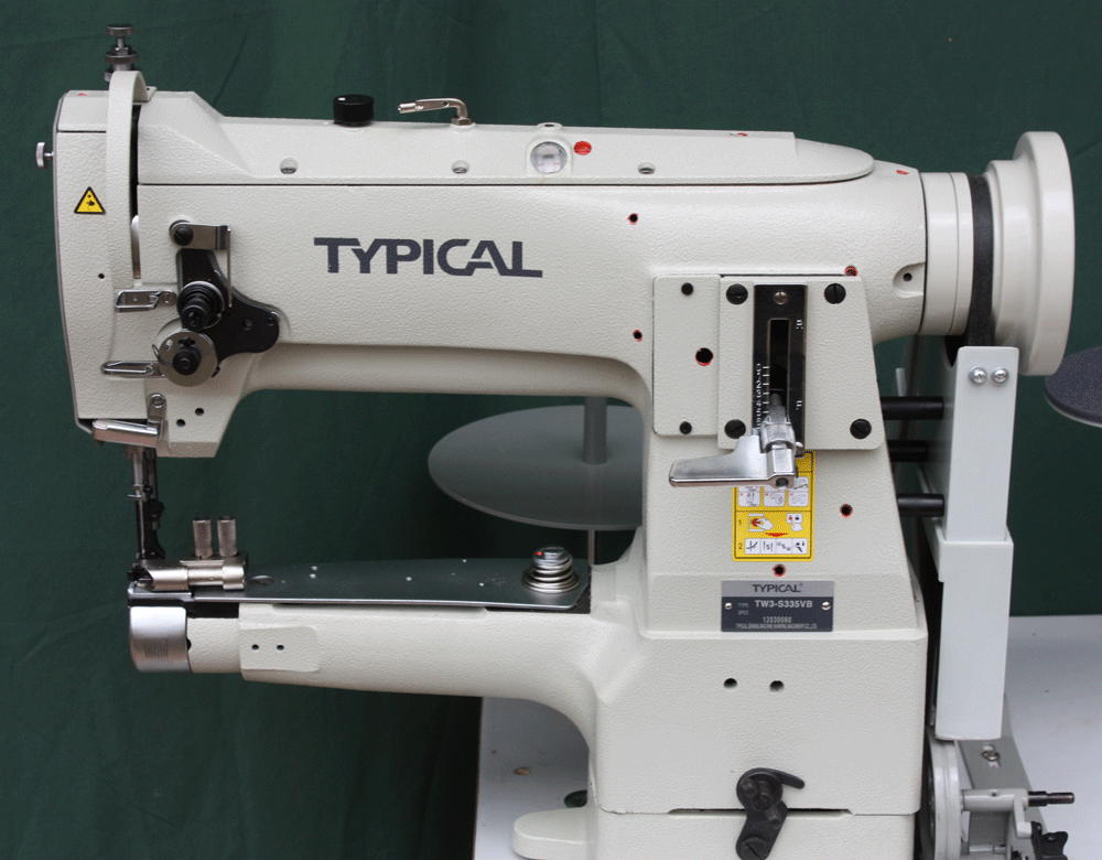 Typical industrial sewing machine compound feed
