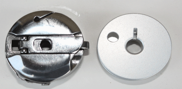 Bobbin Case and Large Bobbin 9 X 28 mm, larger than walking foot plain machine large bobbins.
