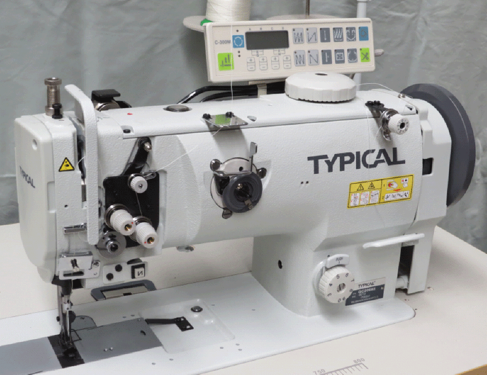 Typical GC 20665 compound feed with thread trim, climbing device, top Lord bobbin.