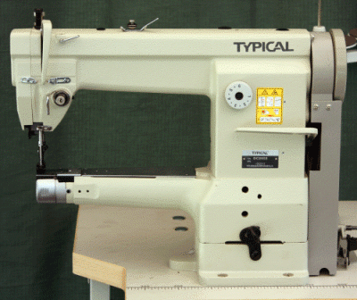 Typical cylinder arm compound feed walking foot budget priced industrial sewing machine.