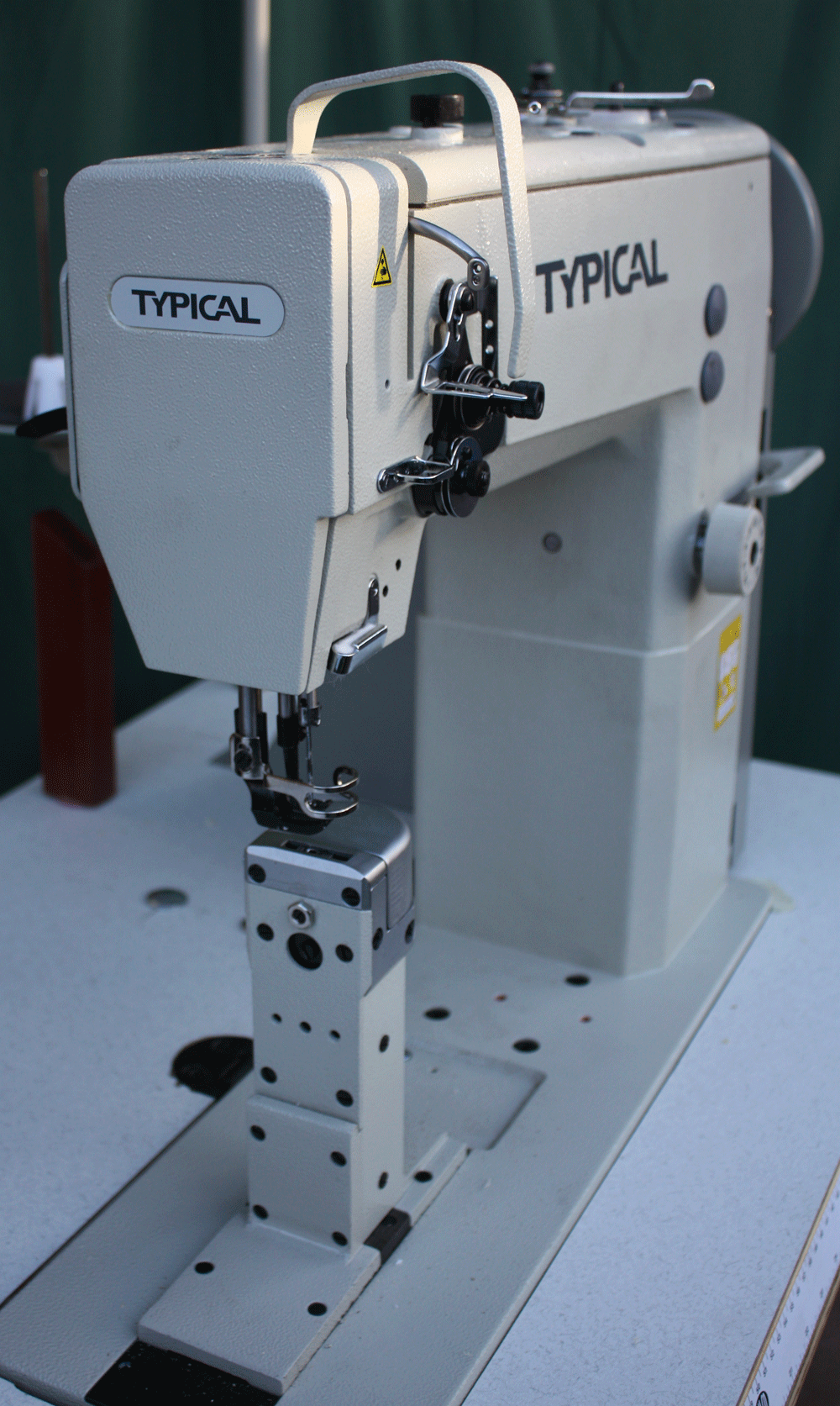 Typical post bed industrial sewing machine